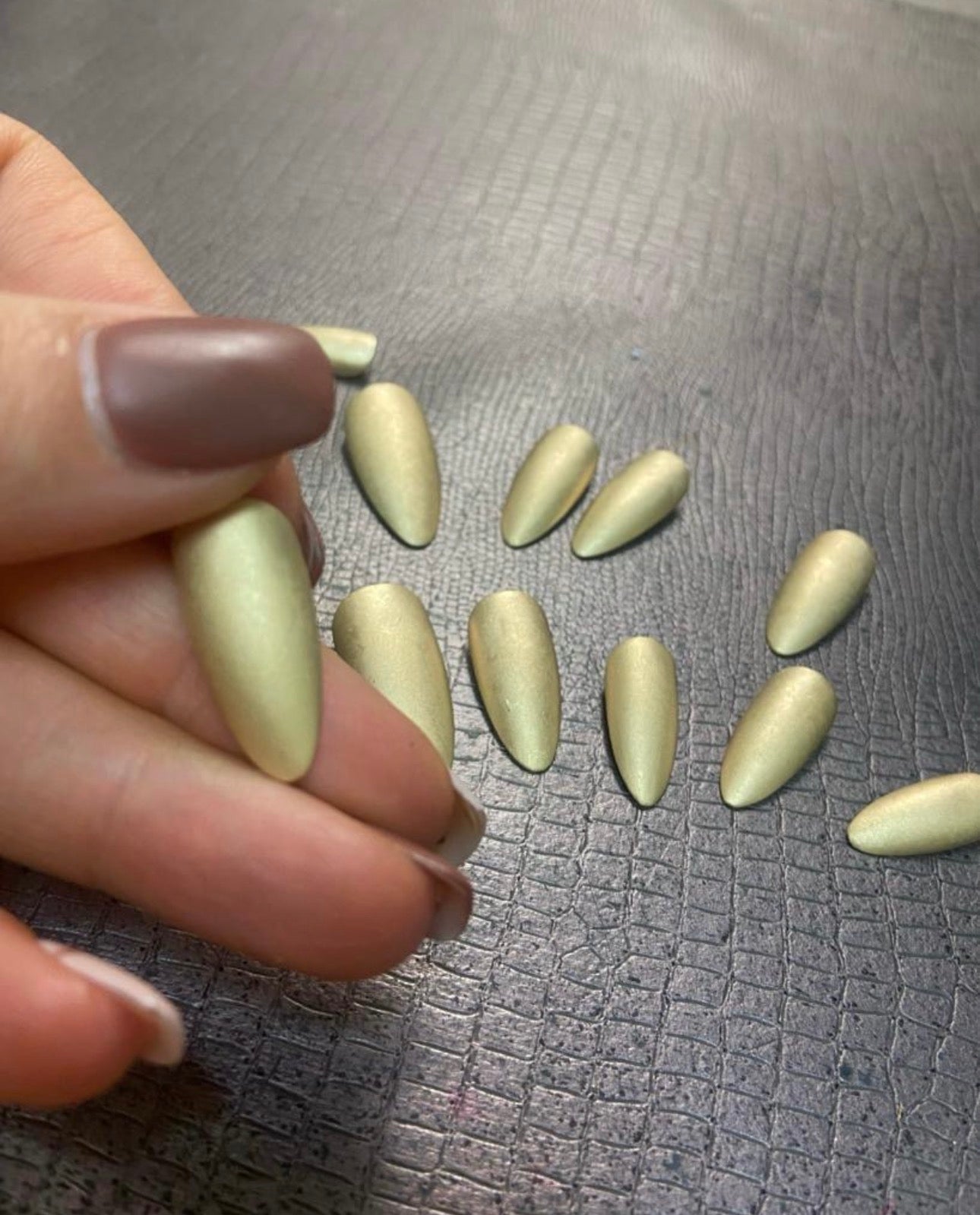 woman wearing solid 14k gold metal nail custom fit nyc handcrafted